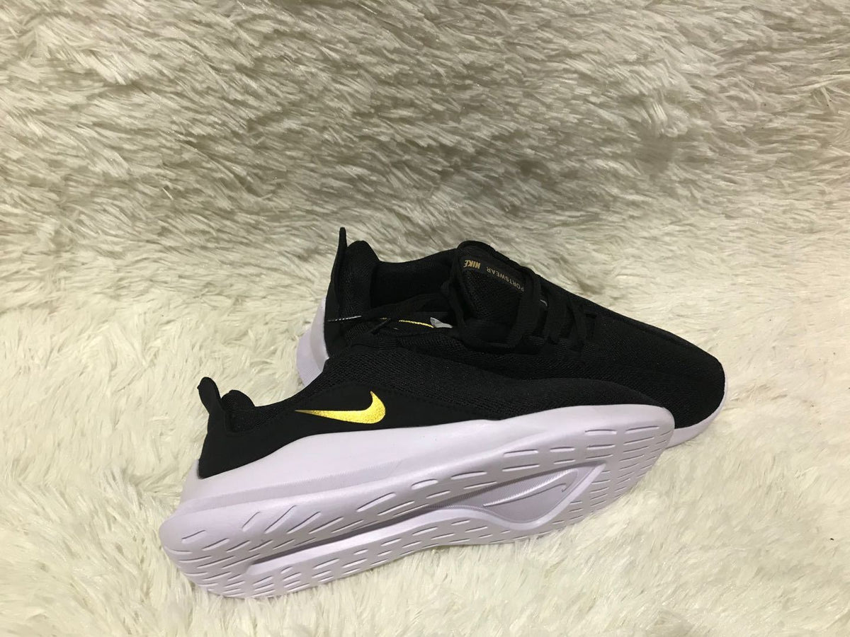 Nike Runallday 2 Running Shoes in Black and White - product image from the listing.