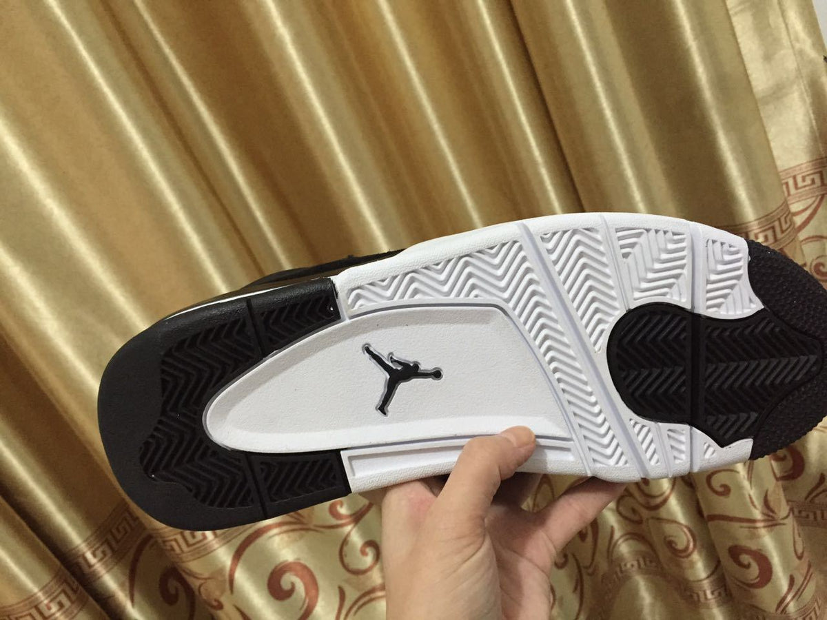 Jordan 4 High-Top Sneakers in Black and Gold - product image from the listing.
