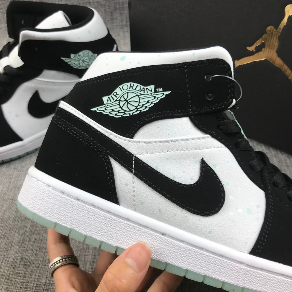 Air Jordan 1 Mid Sneakers in Black White Mint BQ6931-103 - product image from the listing.