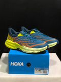 HOKA Speedgoat 6 Trail Running Shoes in Blue Yellow - product image from the listing.