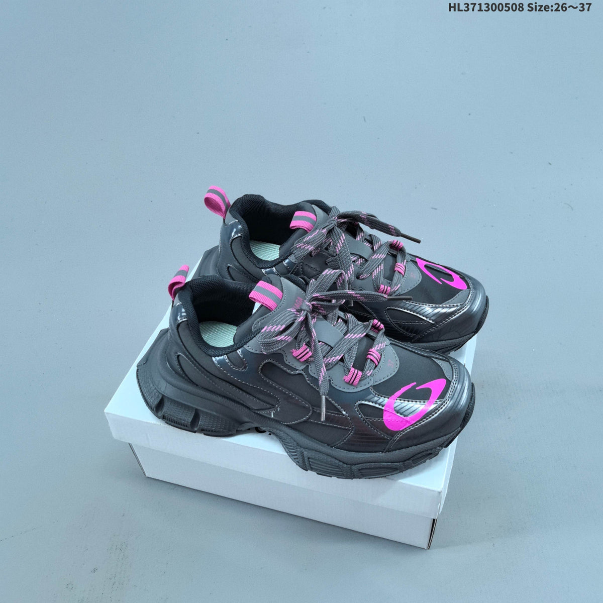 Balenciaga Kids Chunky Lace-Up Sneakers, in Silver and Charcoal - product image from the listing.