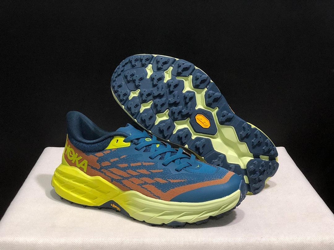 HOKA Speedgoat 6 Trail Running Shoes in Blue Yellow - product image from the listing.