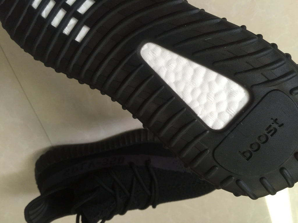 Adidas Yeezy Boost 350 V2 Sneakers in Black Knit - product image from the listing.