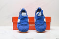 Jacquemus x Nike Jacumoon Low-Top Sneakers, in Blue and White - product image from the listing.