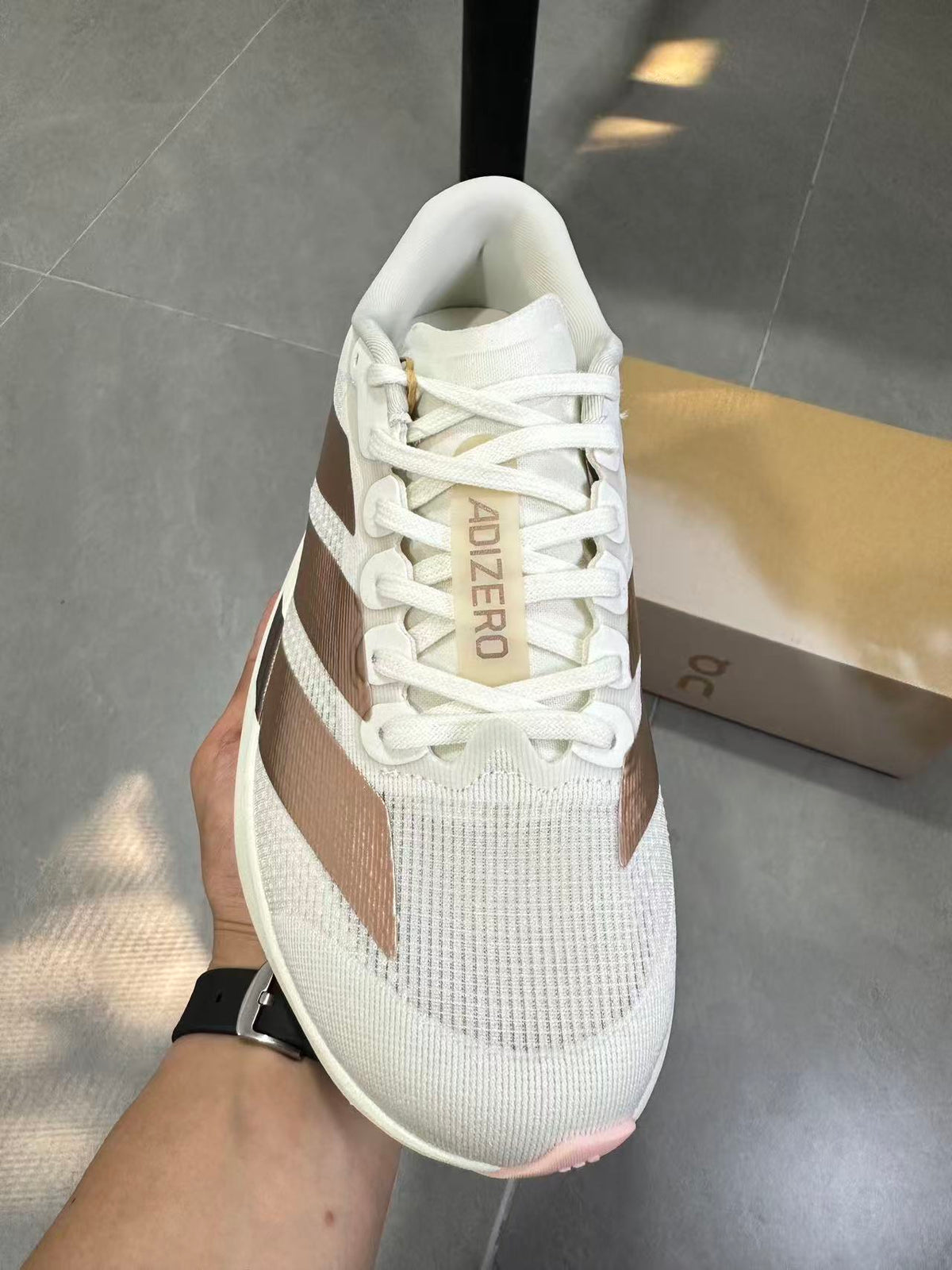 Adidas Adizero Lightstrike Pro White Champagne Shoes for Running - product image from the listing.