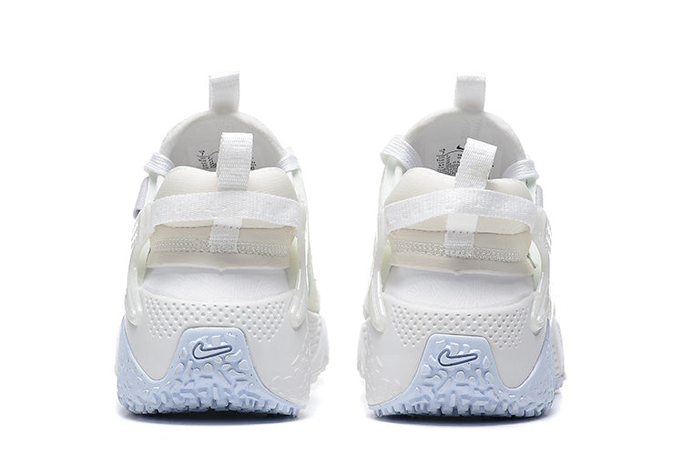 White and Pale Blue Nike Air Huarache Run Sneakers - product image from the listing.