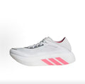 Nike White and Red Three-Stripe Shoes for Running - product image from the listing.