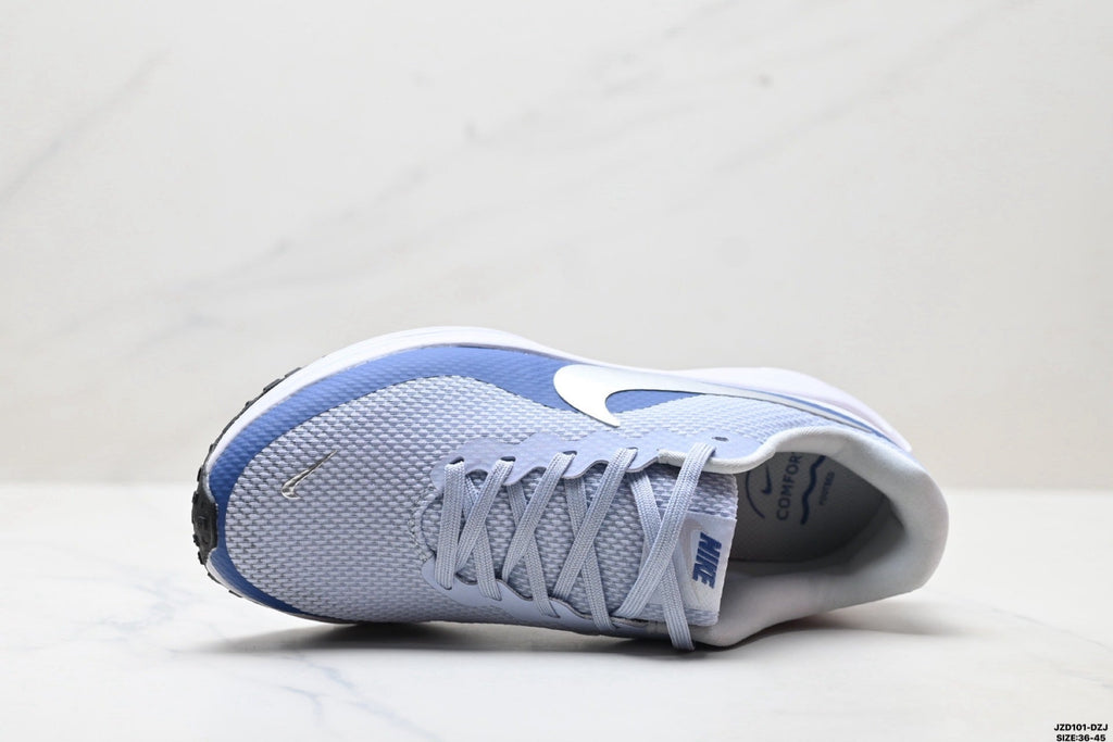 Nike Revolution 8 Running Shoes, in Light Blue and Navy - product image from the listing.