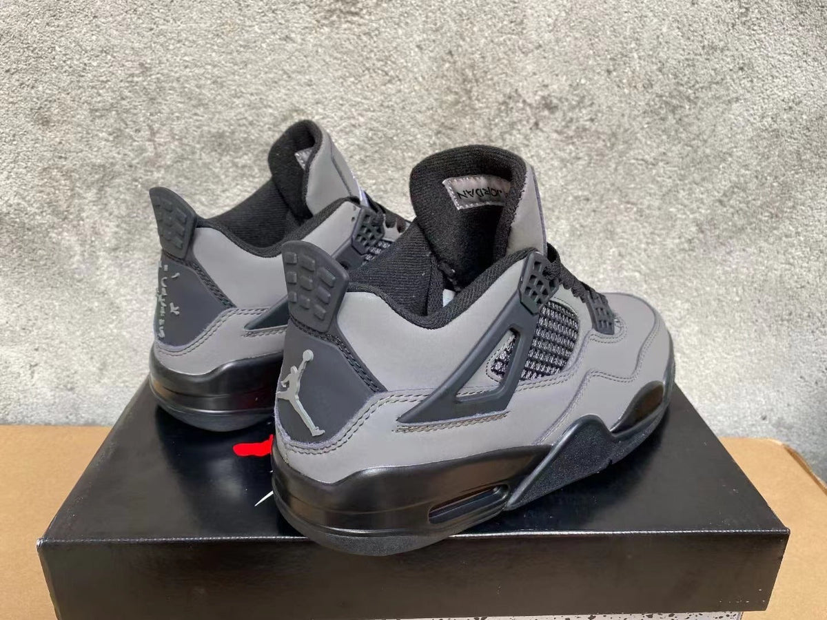 Air Jordan 4 Sneakers in Grey & Black - product image from the listing.