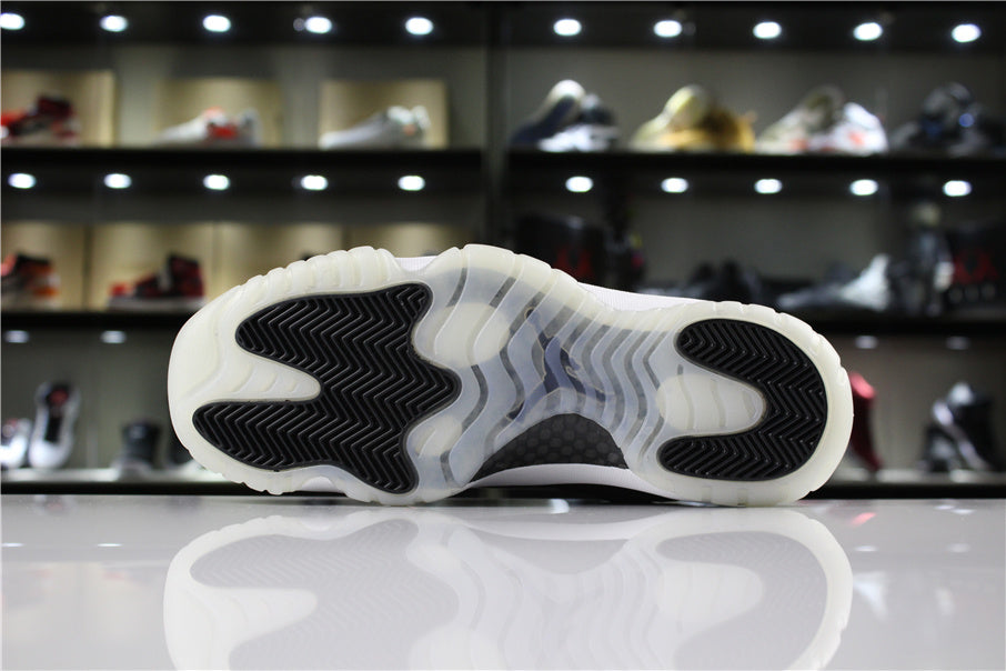 Jordan 11 Retro Low Barons Sneakers in Black White - product image from the listing.