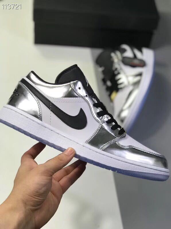 Jordan 1 Low Leonard Sneakers in Silver and White - product image from the listing.