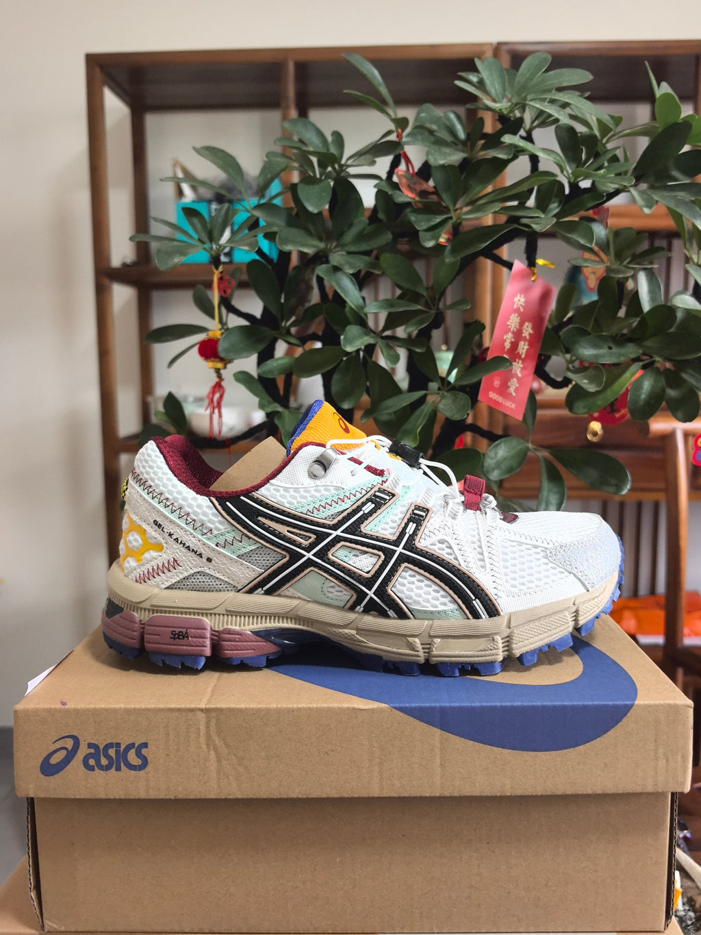 ASICS GEL-KAYANO 5 Sneakers in White Black Red - product image from the listing.
