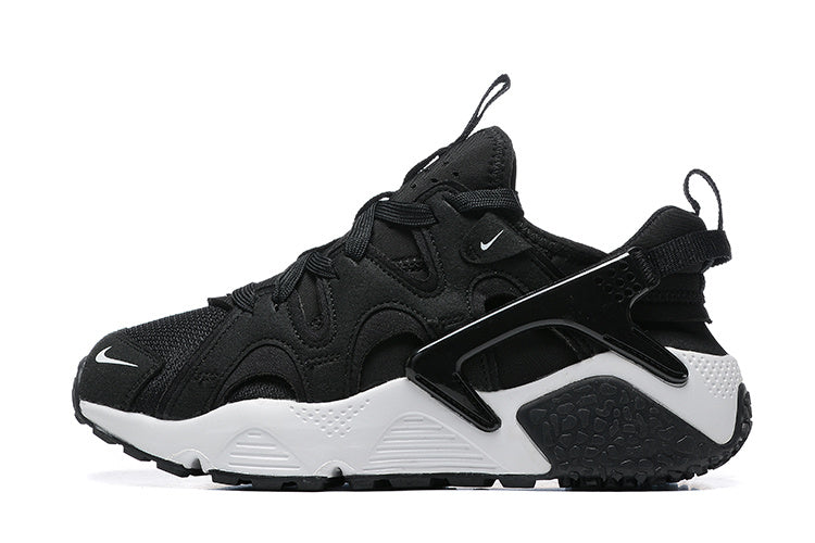 Nike Air Huarache Sneakers in Black and White - product image from the listing.