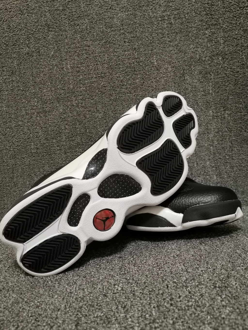Air Jordan 13 Retro Black Red White Sneakers - product image from the listing.