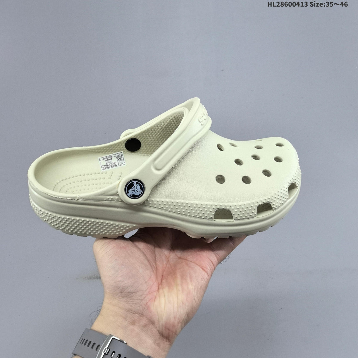 Crocs Classic Clog in Black or in Bone - product image from the listing.