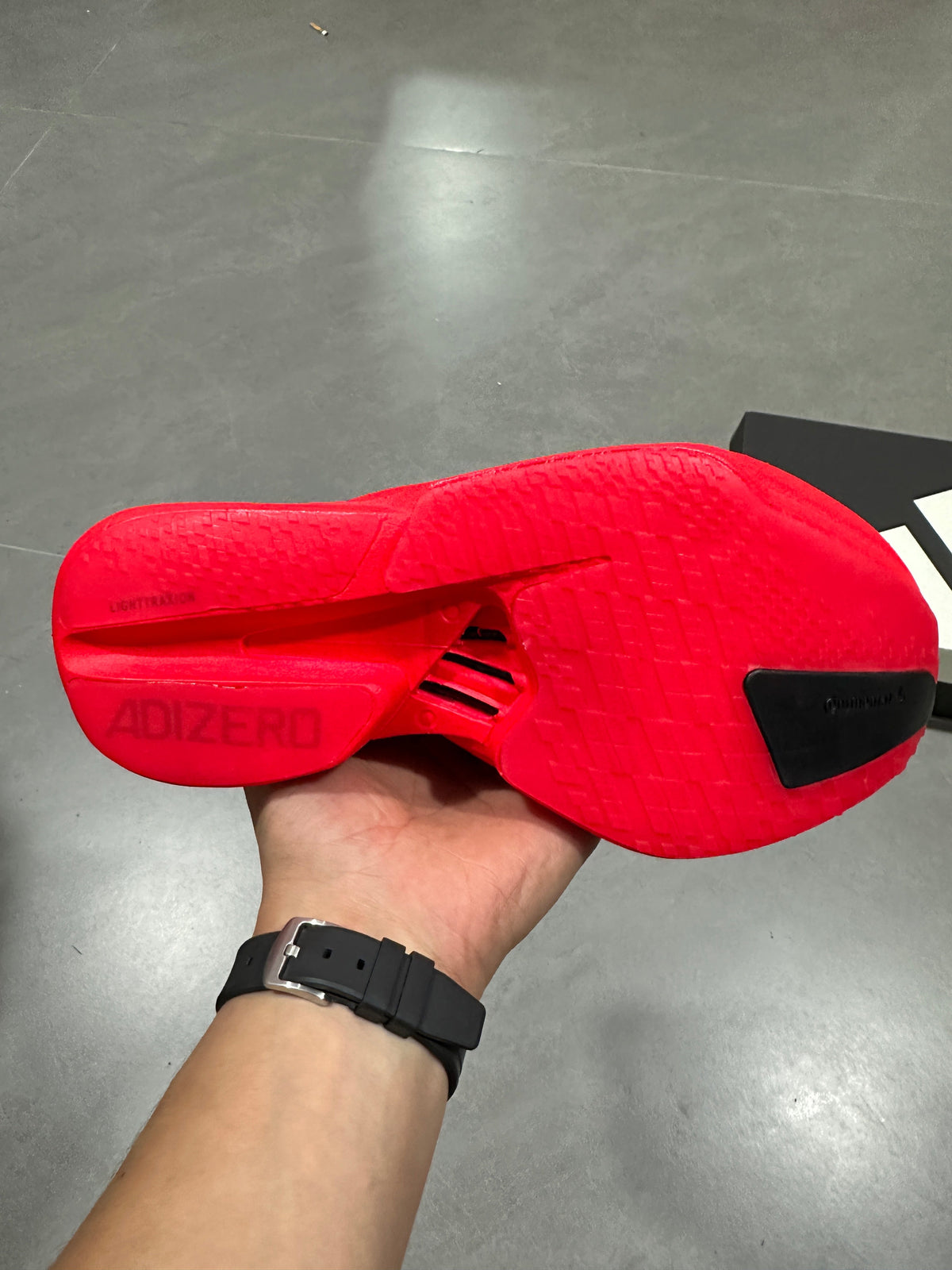 Nike Adizero Evo SL Running Shoes in Red Black JR6356 - product image from the listing.