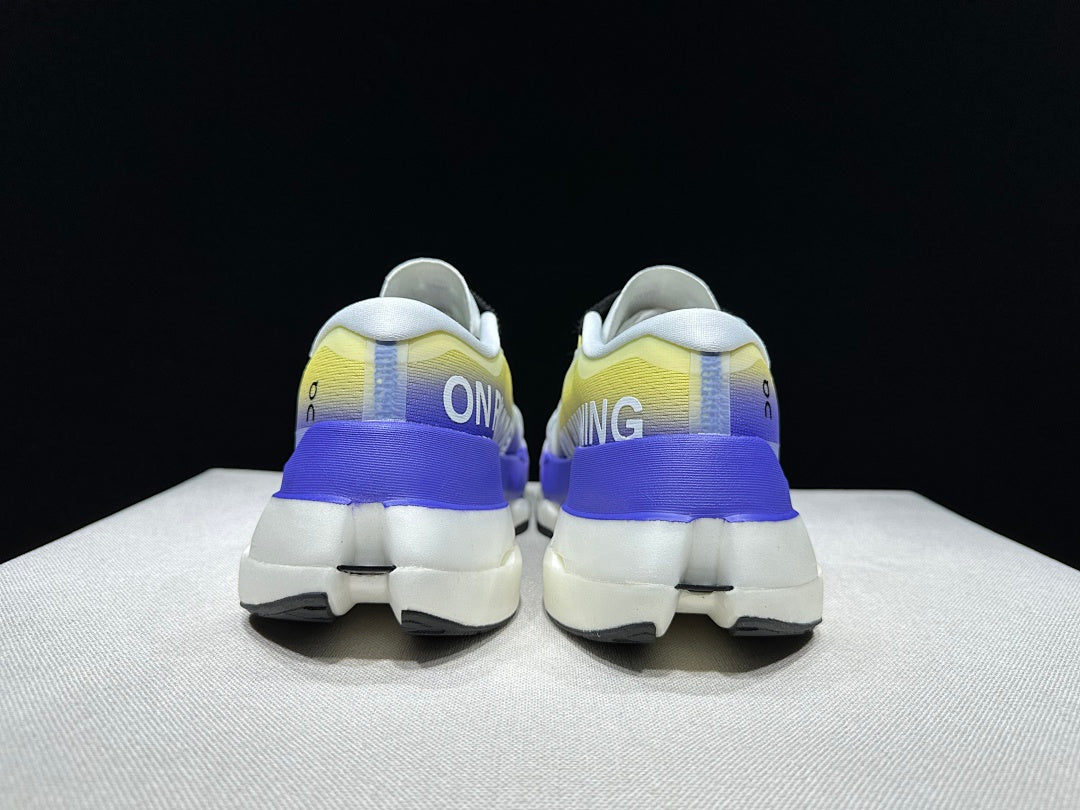 On Cloudboom Max Running Shoes, in White Yellow Purple - product image from the listing.