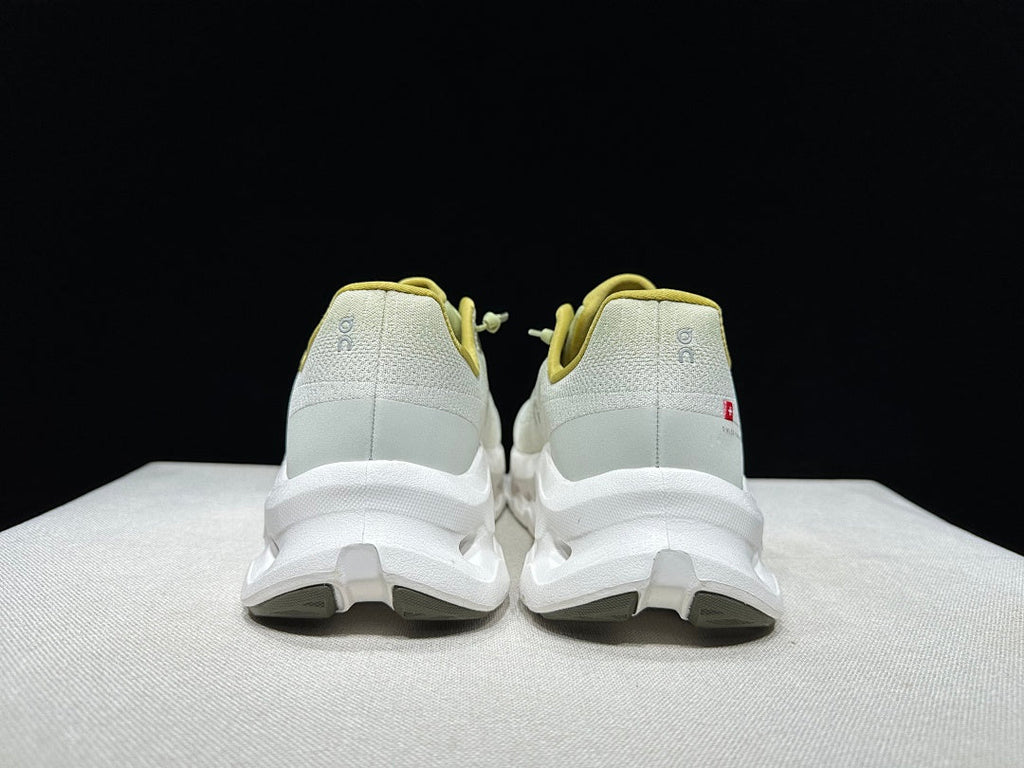 White and Yellow On Cloudtilt Sneakers - product image from the listing.