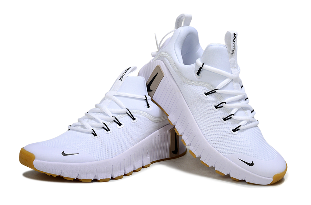 Nike Free White Trainers with Gum Outsole - product image from the listing.