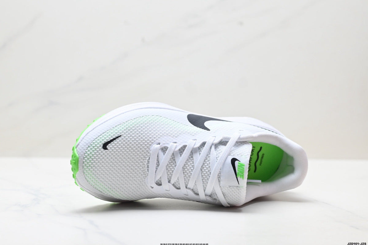 Nike Revolution 8 Running Shoes in White and Green - product image from the listing.