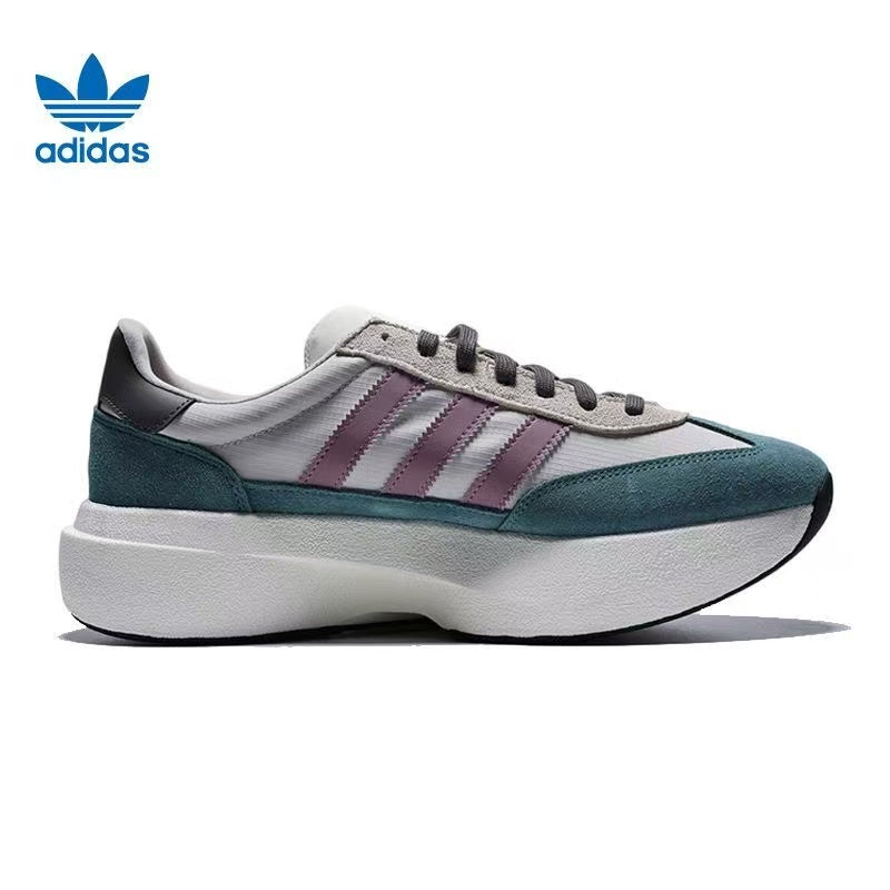 Adidas White and Green Platform Trainers with Mauve Stripes - product image from the listing.