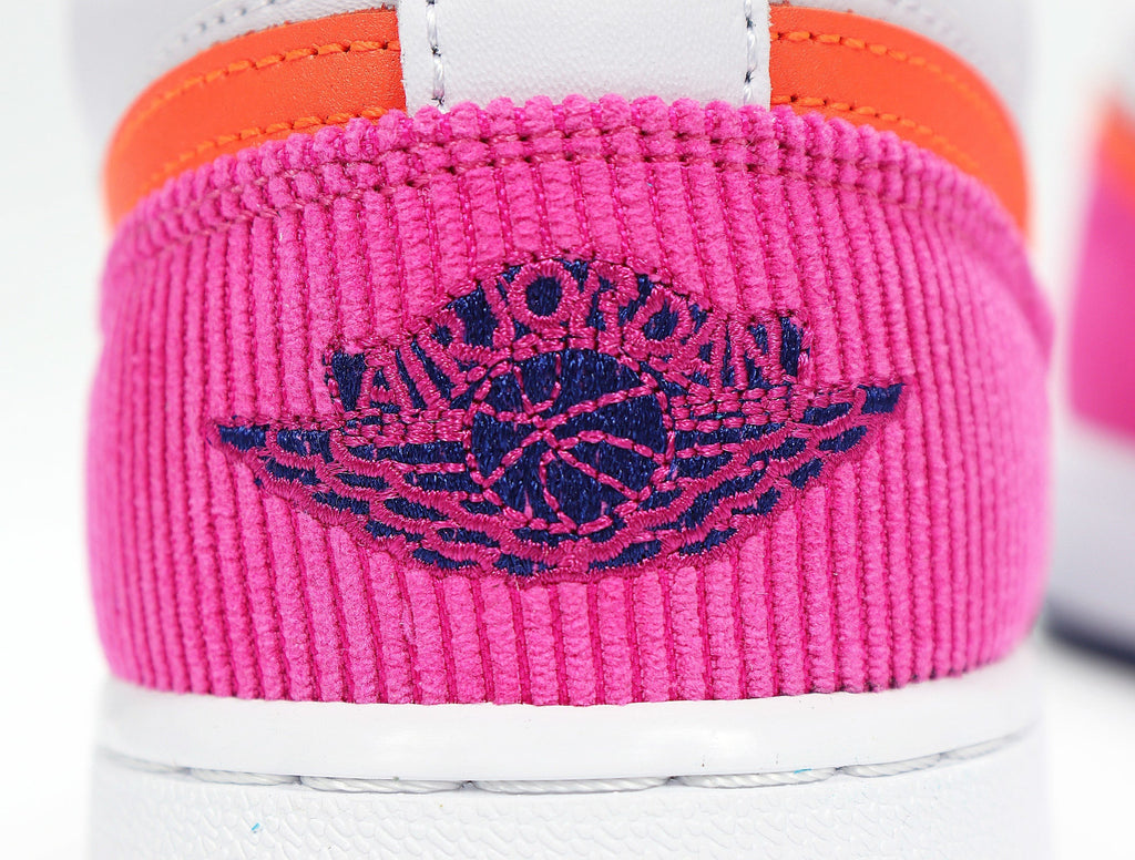 Jordan 1 Low SE Sneakers in Pink Gray Orange 554723-502 - product image from the listing.
