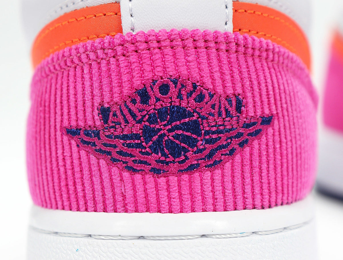 Jordan 1 Low SE Sneakers in Pink Gray Orange 554723-502 - product image from the listing.