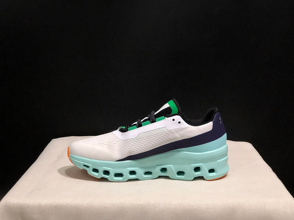 White and Aqua On Cloudmonster Running Shoes - product image from the listing.