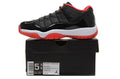 Air Jordan 11 Retro Low Black Red Sneakers - product image from the listing.
