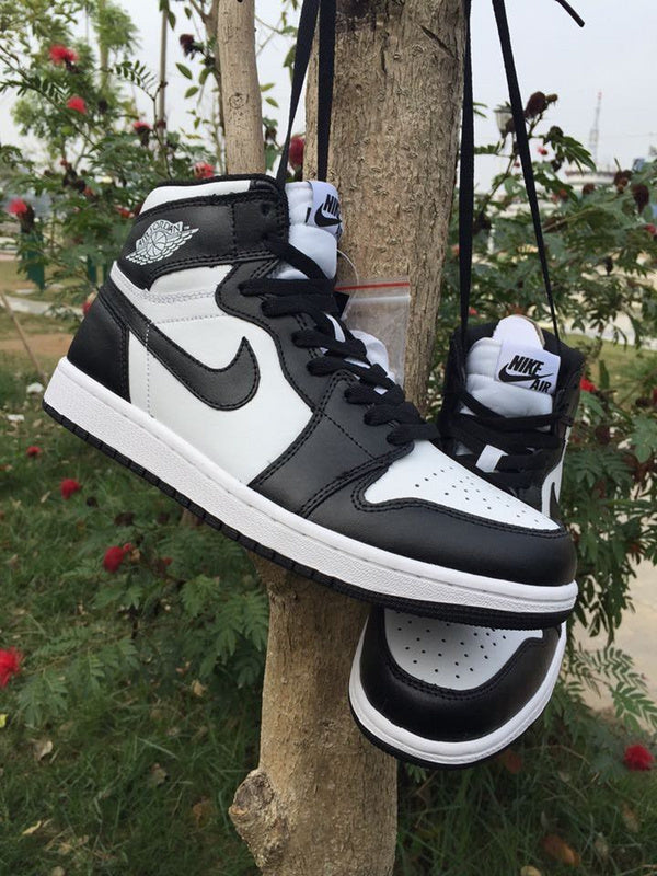 Jordan 1 High Sneakers in Black and White - product image from the listing.