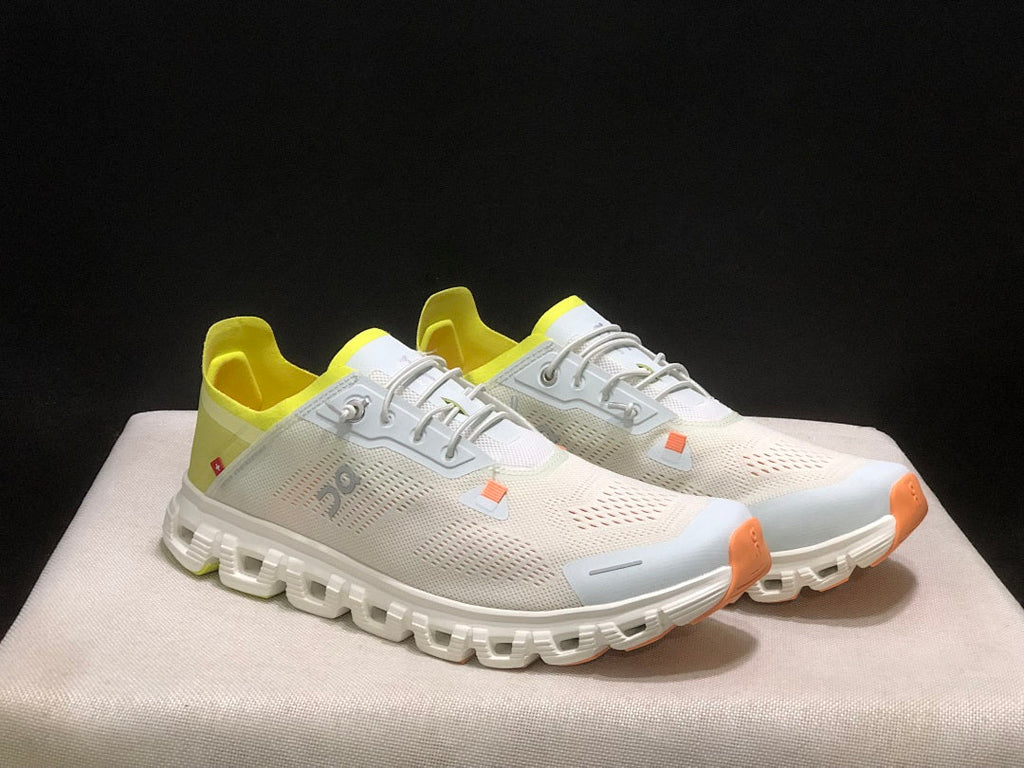 On Cloud 6 Coast Sneakers in Ivory, in Yellow and Orange - product image from the listing.