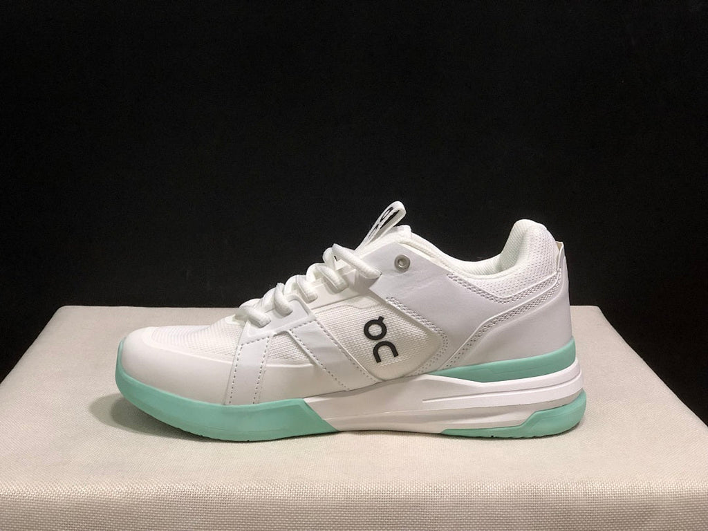On THE ROGER Clubhouse Pro Tennis Shoes in White Mint Green - product image from the listing.