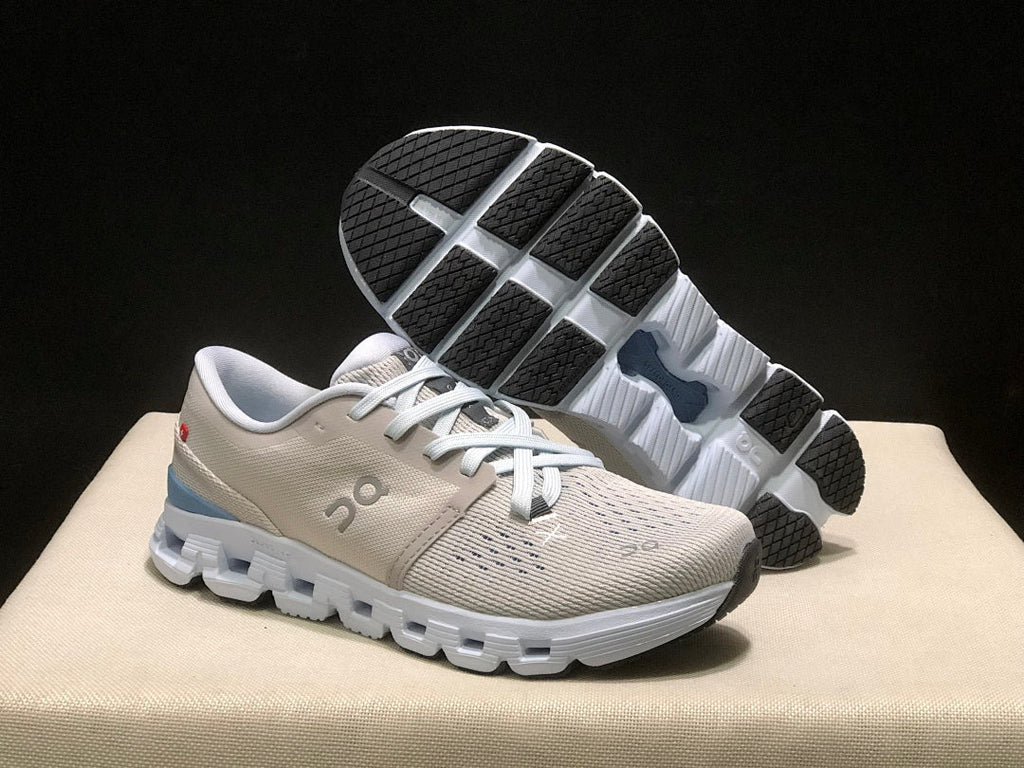 Silver and Blue On Cloud X 4 Sneakers - product image from the listing.
