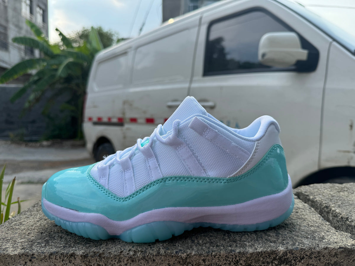 Air Jordan 11 Retro in White/Light Green - product image from the listing.