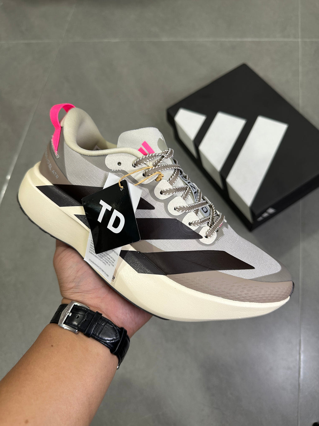 Adidas Adizero SL 2 Running Shoes, in Beige and Black KI5181 - product image from the listing.