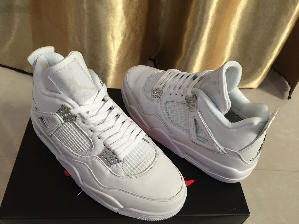 Air Jordan 4 Retro White High-Top Sneakers - product image from the listing.