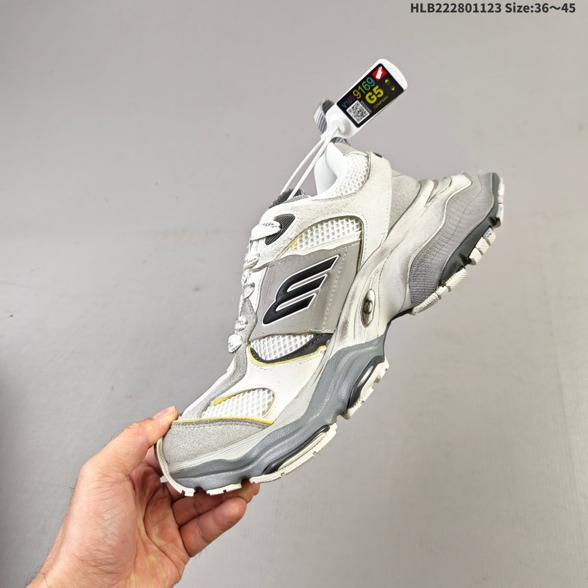 Gray and White Balenciaga Monday Low-Top Sneakers - product image from the listing.