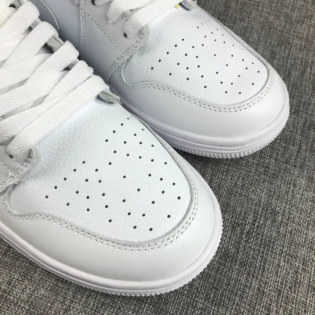 Air Jordan 1 Mid Sneakers in White - product image from the listing.