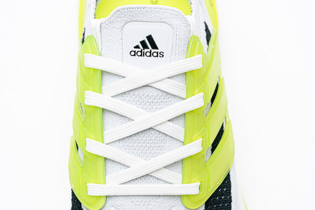 adidas UltraBoost 21 Running Shoes, in White and Volt FY1214 - product image from the listing.
