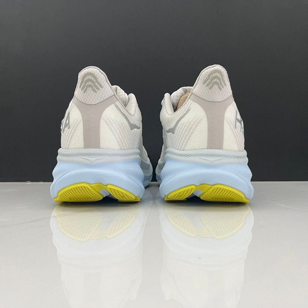 Gray and Blue HOKA Clifton 9 Running Shoes - product image from the listing.
