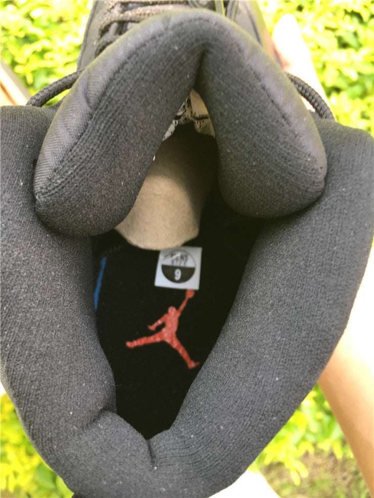 Air Jordan 12 Black Nylon High-Top Sneakers - product image from the listing.