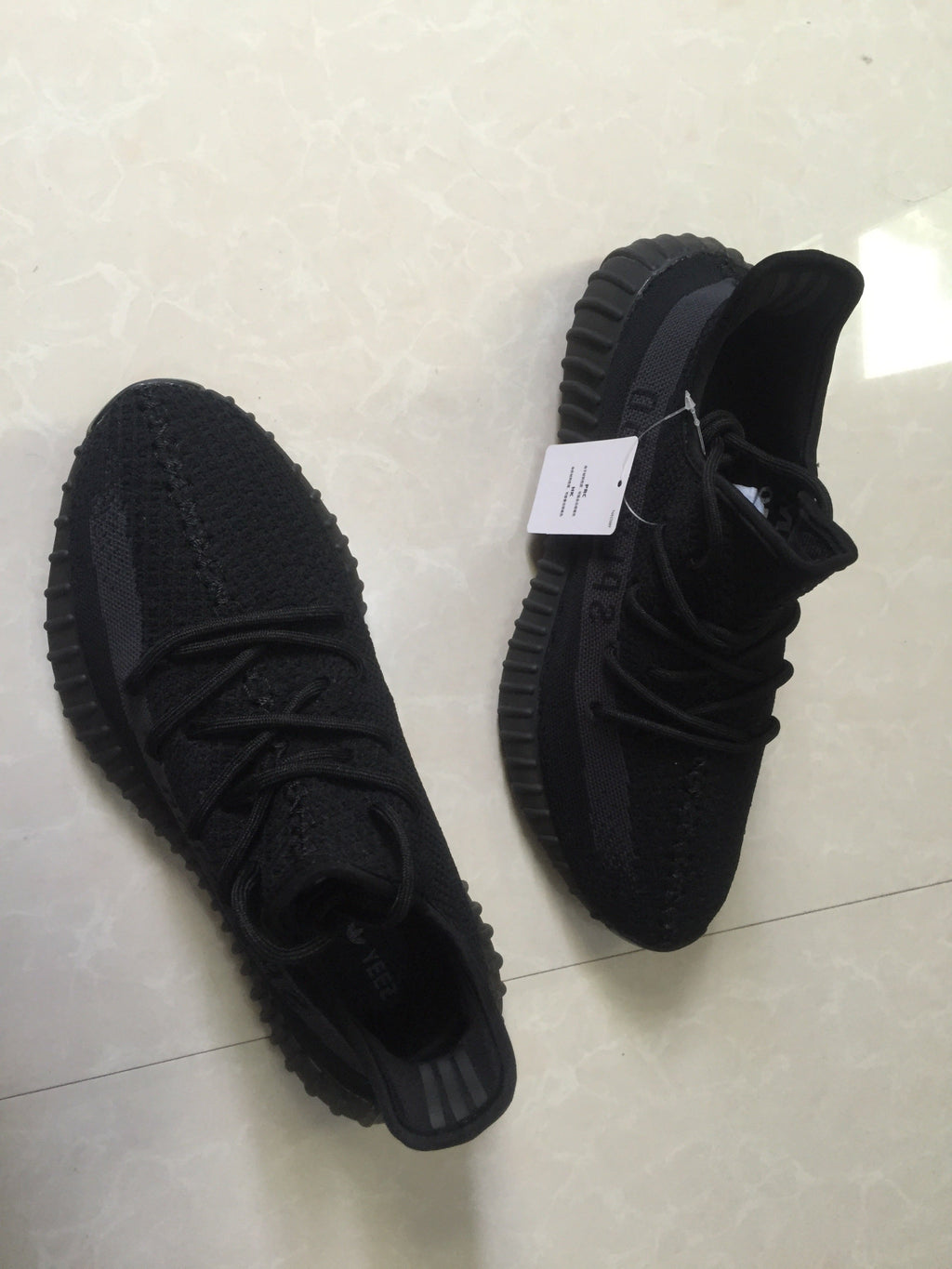 Adidas Yeezy Boost 350 V2 Sneakers in Black Knit - product image from the listing.