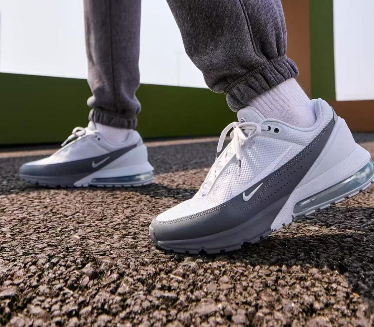 Nike Air Max 2090 Sneakers in White and Dark Grey - product image from the listing.