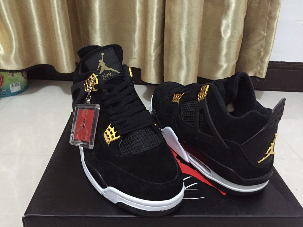 Jordan 4 High-Top Sneakers in Black and Gold - product image from the listing.