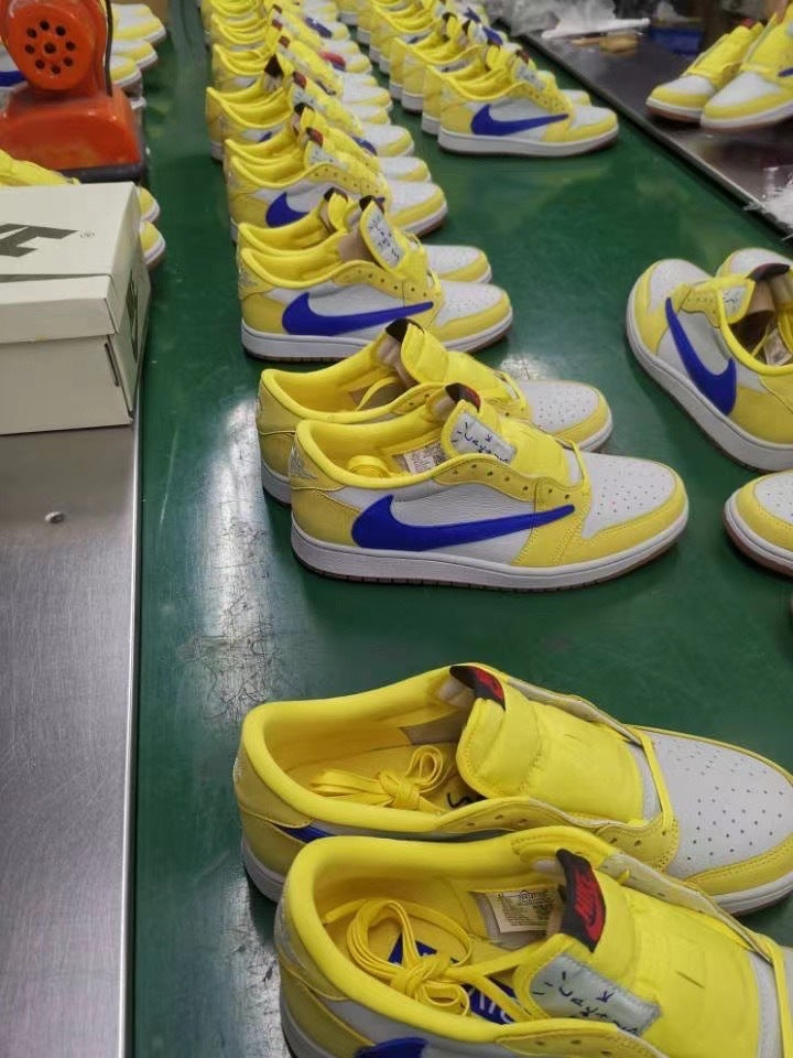 Jordan 1 Low Sneakers in Canary Yellow and Blue DZ4137-700 - product image from the listing.