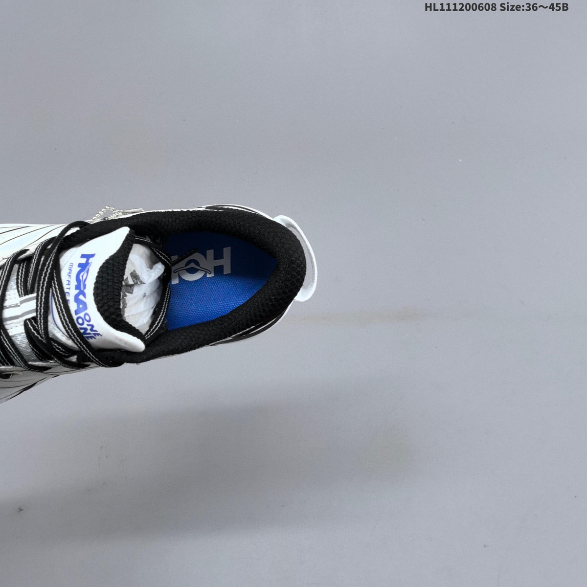 HOKA Mafate Speed 2 Low Trail Running Shoes, in White Black Blue - product image from the listing.