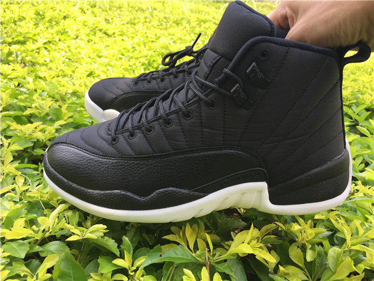 Air Jordan 12 Black Nylon High-Top Sneakers - product image from the listing.