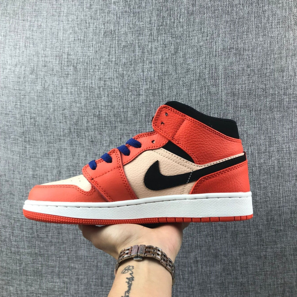 Air Jordan 1 Mid GS Sneakers in Pink and Orange - product image from the listing.