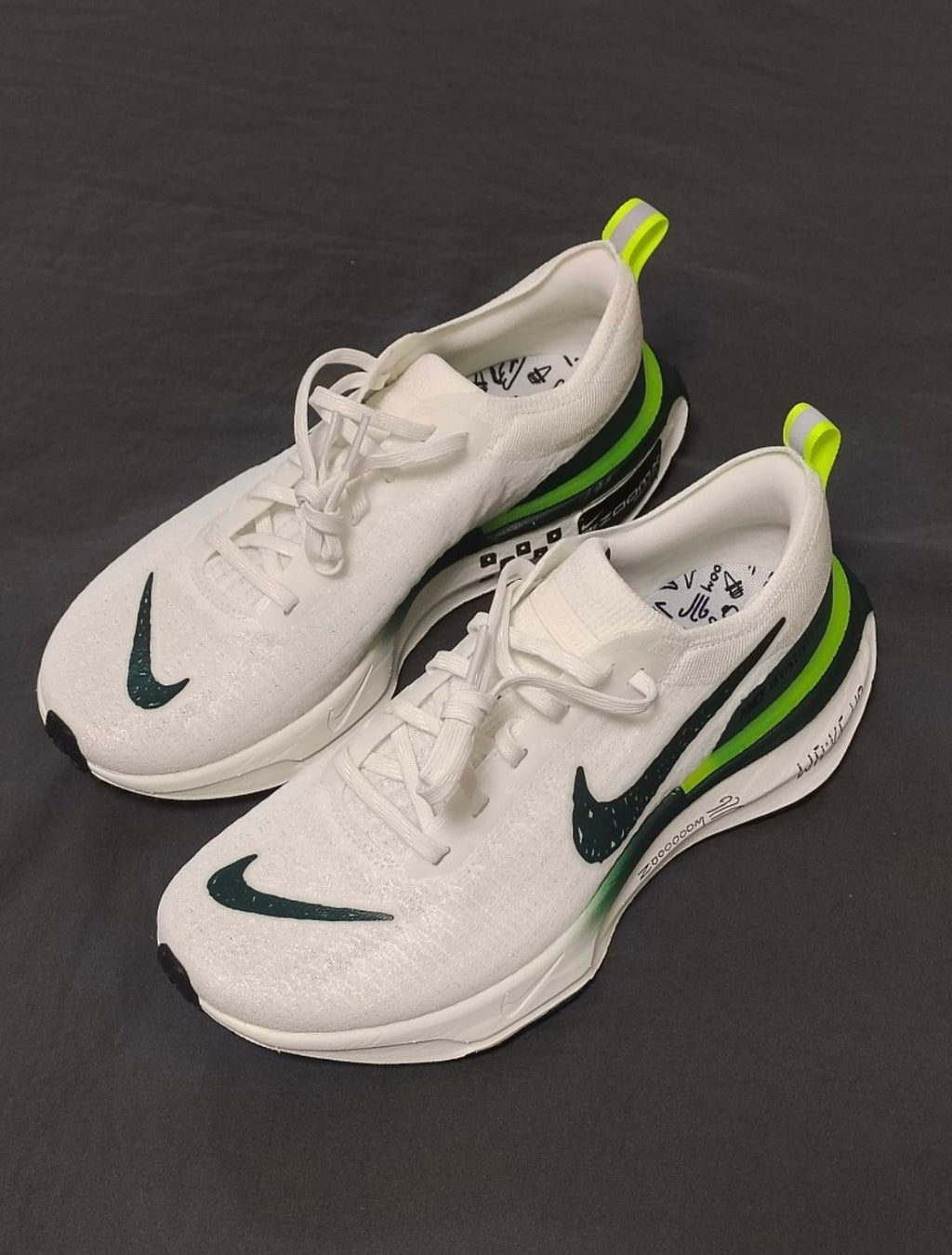 Nike ZoomX Invincible Run 3 Running Shoes in White Green FZ4018-100 - product image from the listing.