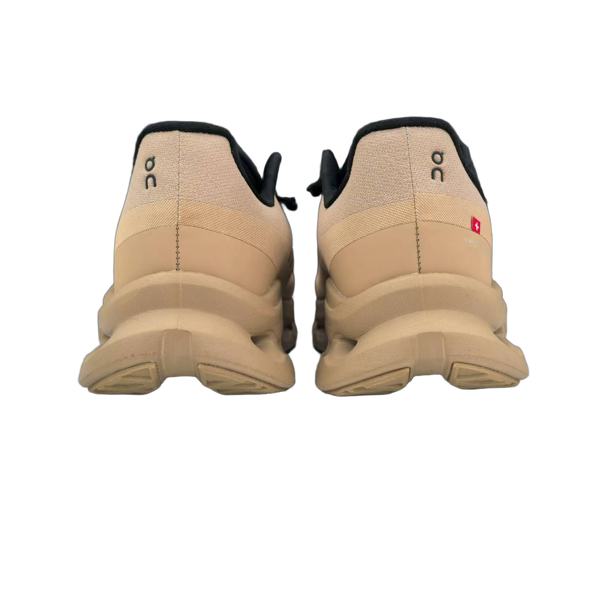 Beige and Black On Running Shoes - product image from the listing.